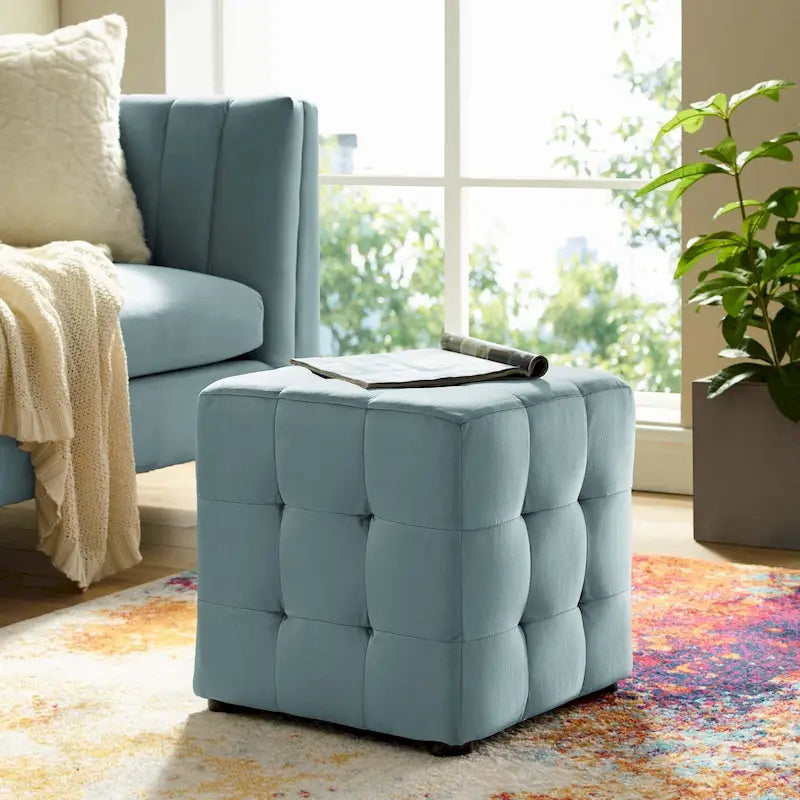 Pouf cube capitonné en velours